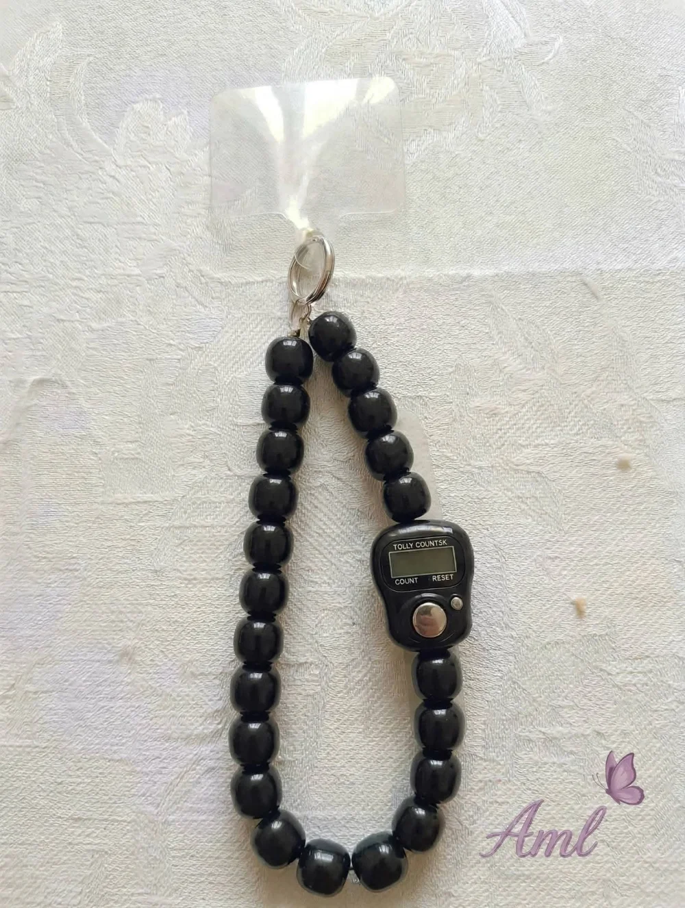 ميدالية هاتف مسبحة